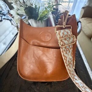 Stylish Tan Leather Bag with Patterned Strap